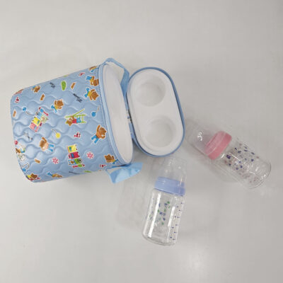 blue (with dolls) bottle warmer